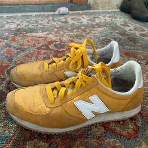 Mustard yellow New Balance trainers